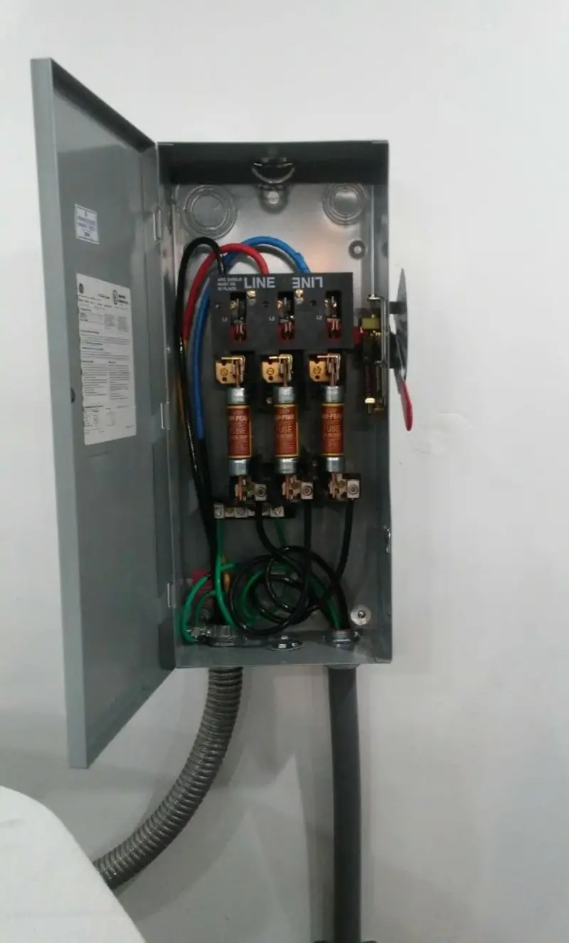 Three-phase disconnect switch installed for Smoke Detector Installation in Port Washington North